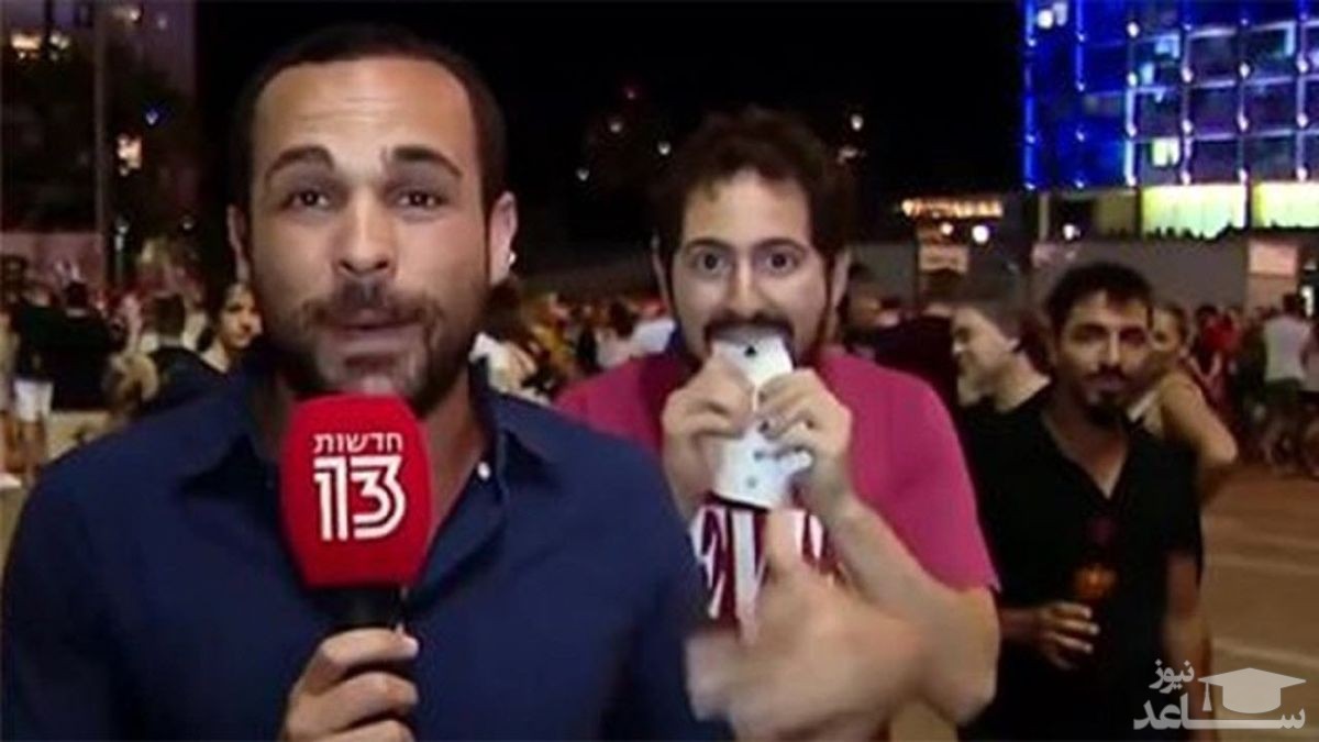 (فیلم) کارهای عجیب یک مرد پشت سر گزارشگر تلویزیون!