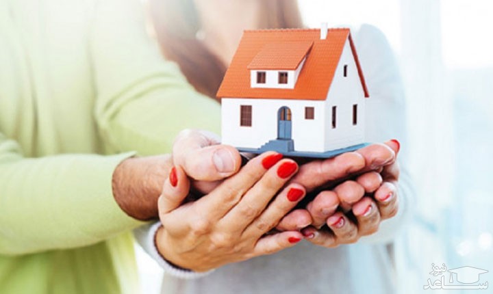 ماکت خانه در دست زن و شوهر