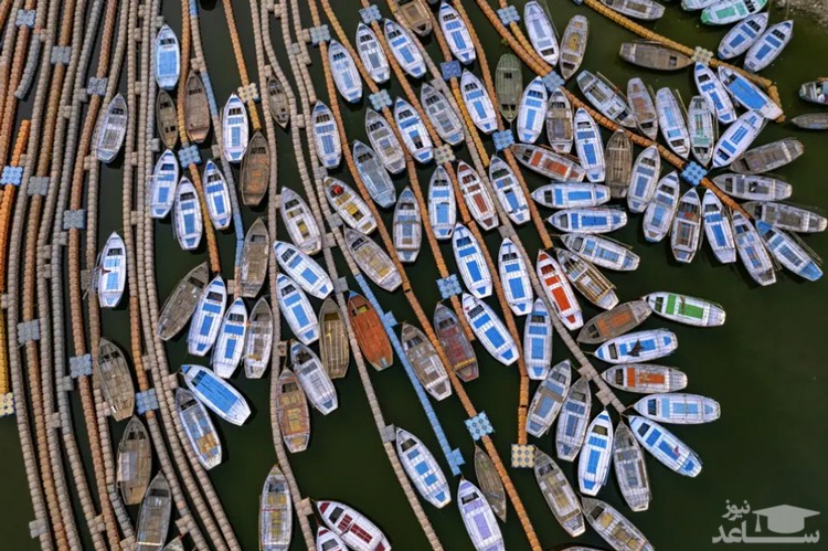 قایق های چوبی روی رود یامونا در هند/ آسوشیتدپرس