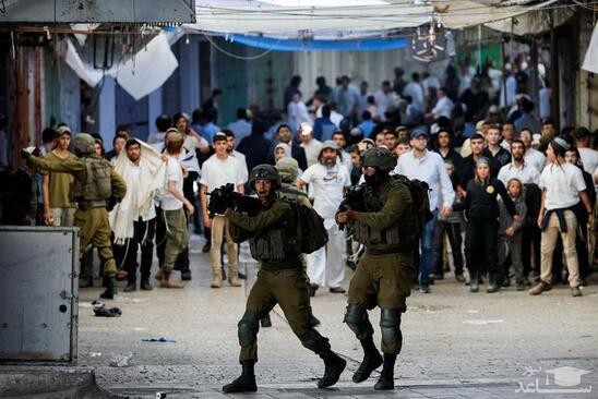 حمله شهرک نشینان اسراییلی به فلسطینی ها در شهر الخلیل در کرانه باختری فلسطین/ رویترز