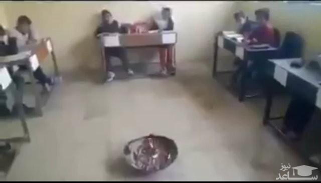 (فیلم) گرم شدن دانش‌آموزان با آتش هیزم!