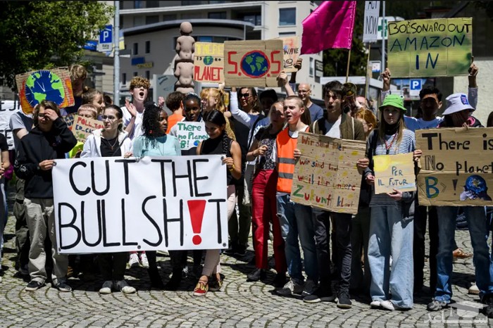 اعتراضات فعالان محیط زیست در حاشیه مجمع سالانه اقتصاد جهانی در داووس سوییس/ EPA