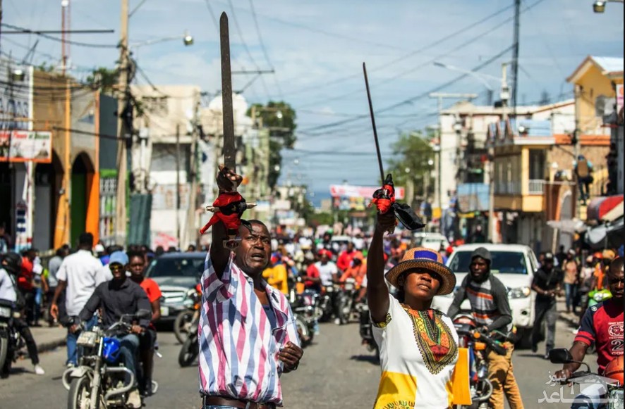 اعتراض مردم شهر "پورتوپرنس" (پایتخت) هاییتی به افزایش موارد آدم ربایی های مرتبط با باندهای خلافکار در این شهر/ خبرگزاری فرانسه