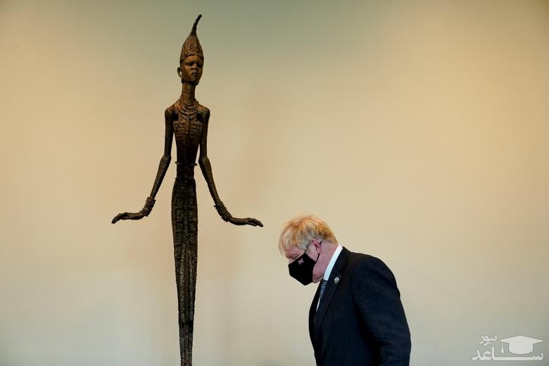 مجسمه هدیه یک هنرمند نیجریه ای به سازمان ملل در مقر این سازمان در نیویورک و در حاشیه دیدار نخست وزیر بریتانیا با دبیر کل سازمان ملل/ رویترز