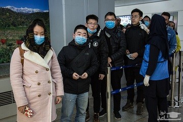 فیلمی از معاینه مسافران چین با اسکنر حرارتی در فرودگاه امام