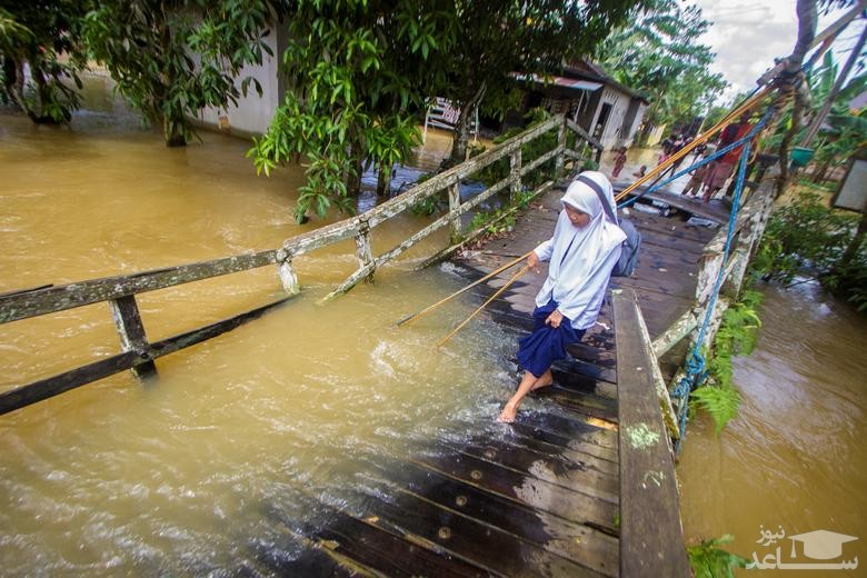 سیلاب در روستایی در جاوه اندونزی/ رویترز