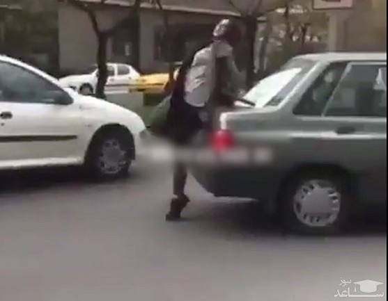 (فیلم) حمله دختر بی ام و سوار به کانکس پلیس در بلوار اندرزگوی تهران