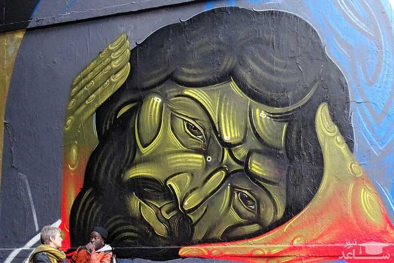 نقاشی رو دیوار خیابان پاریس