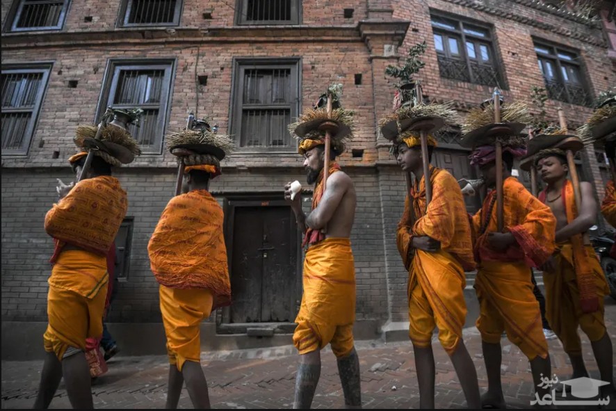 فداییان هندو در جشنواره آیینی یک ماهه "ماهاو نارایان" در شهر "باختاپور" نپال در یک راهپیمایی مذهبی شرکت کرده اند./ خبرگزاری فرانسه