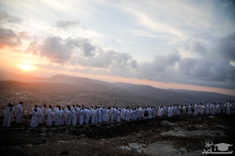 اعضای جامعه سامری در زیارت سنتی به مناسبت تعطیلات "سوکوت" یا جشن خیمه ها در بالای کوه "گریزیم" در نزدیکی نابلس در کرانه باختری فلسطین/ رویترز