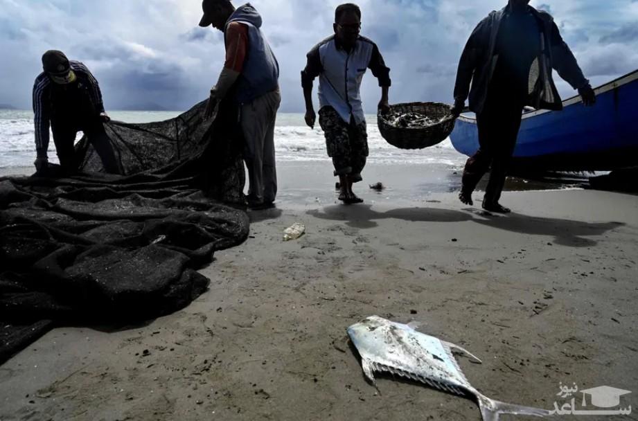 ماهیگیران در ساحل بندر آچه اندونزی