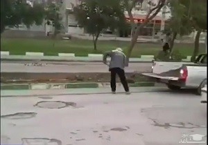(فیلم) اقدام عجیب شهرداری شوشتر برای ترمیم خیابان!