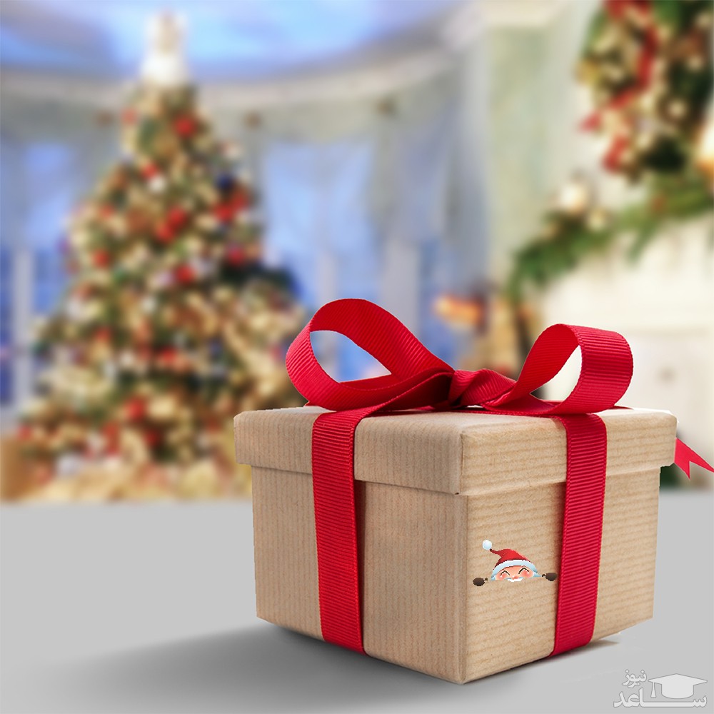 (عکس) شادی کودک عراقی از هدیه های بابانوئل