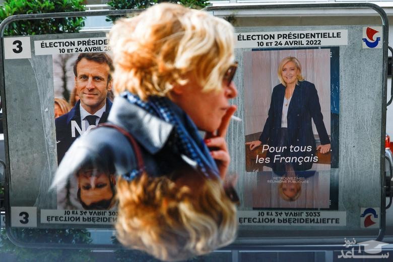 پوسترهای تبلیغاتی دو نامزد مرحله دوم انتخابات ریاست جمهوری فرانسه در شهر پاریس/ رویترز
