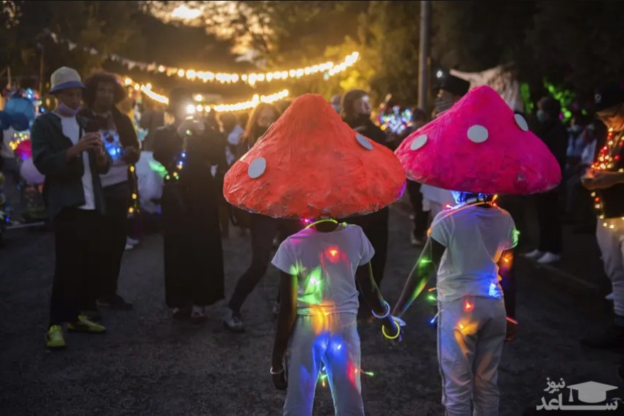 کودکان با کلاه های قارچی در جشنواره نور در ژوهانسبورگ آفریقای جنوبی/ آسوشیتدپرس