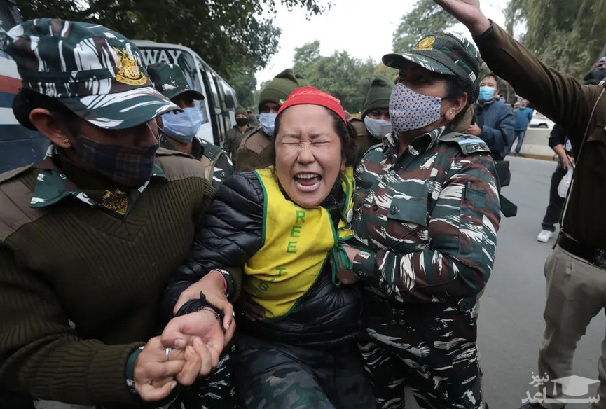 اعتراض تبتی های تبعیدی به برگزاری المپیک زمستانی 2022 پکن در مقابل سفارت چین در شهر دهلی هند/ EPA