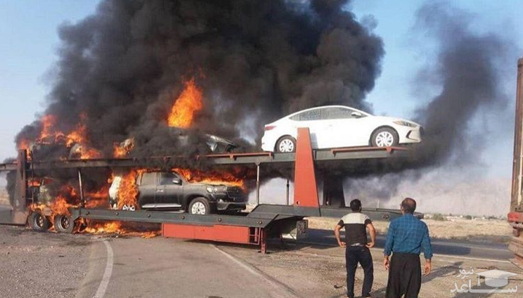 (فیلم) آتش گرفتن تریلی حامل خودروهای لوکس در جاده بندر عباس 