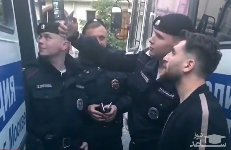 (فیلم) لحظه دستگیری مسی ایرانی در مسکو و سلفی گرفتن پلیس با او