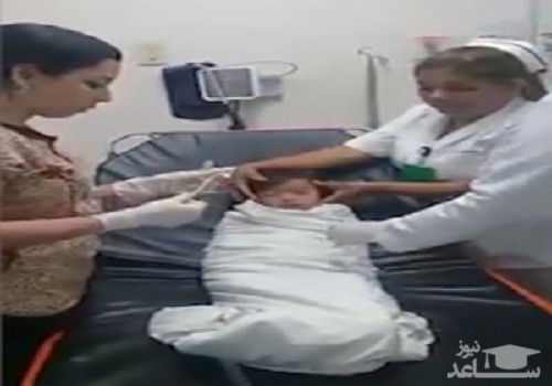 (فیلم) خارج کردن سکه از گلوی کودک توسط پزشک زبردست