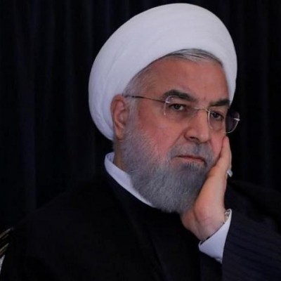 روحانی و فریدون در مراسم تشییع پیکر خواهرشان